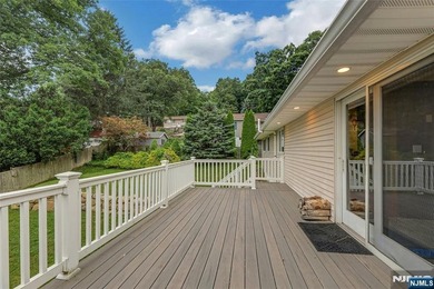This beautiful raised ranch offers a great location with - photo 21