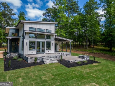 This is Luxury Living at Lake Sinclair! This Modern - Lake Home For Sale in Milledgeville, Georgia