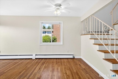 Move-In Ready End Unit! Welcome home to this bright and inviting - photo 11
