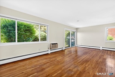 Move-In Ready End Unit! Welcome home to this bright and inviting - photo 12