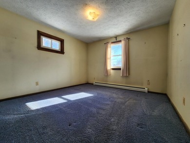 This sunny, well-landscaped ranch is located in-town in a