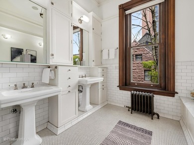 Nestled in the heart of Chicago's prestigious Gold Coast, this - photo 29