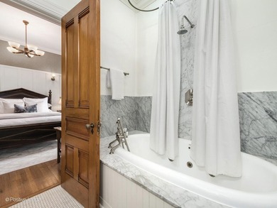 Nestled in the heart of Chicago's prestigious Gold Coast, this - photo 43