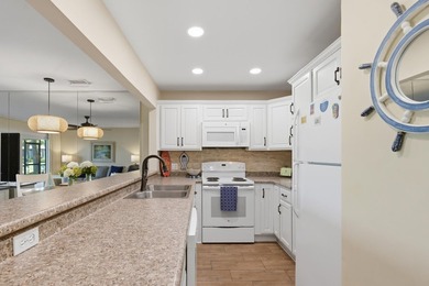 Experience living coastal at it's finest in this beautifully - photo 11