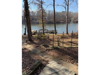 Well maintained home on the lake with pier and boat slip. Home - photo 2