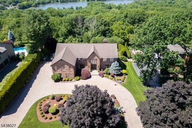 Don't miss this masterfully renovated estate in the desirable - photo 1