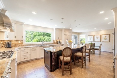 Don't miss this masterfully renovated estate in the desirable - photo 8