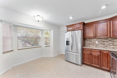 Welcome to this beautifully maintained 3-bed, 2-bath home in the - photo 6