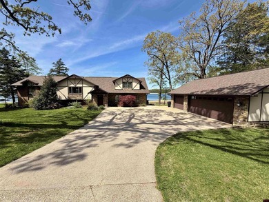 4 bedroom, 3 bath tri-level lake home on Mallard Point Road with - photo 1