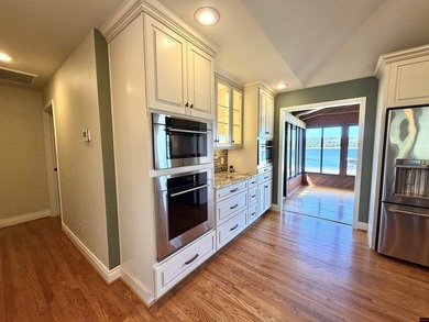 4 bedroom, 3 bath tri-level lake home on Mallard Point Road with - photo 9