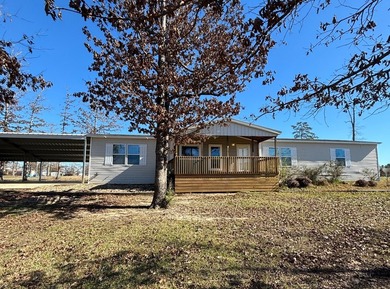 Spacious 4BR/2BA home situated on a 0.69-acre lot offering - photo 2