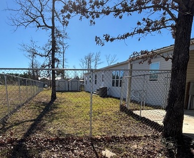 Spacious 4BR/2BA home situated on a 0.69-acre lot offering - photo 3
