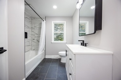 This is a 10/10! Beautifully transformed spacious ranch in the - photo 15