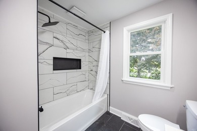 This is a 10/10! Beautifully transformed spacious ranch in the - photo 16