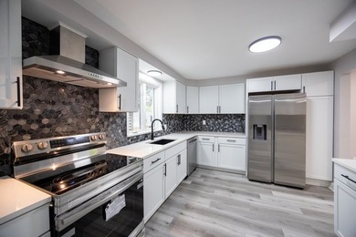 This is a 10/10! Beautifully transformed spacious ranch in the - photo 22