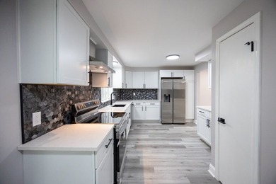 This is a 10/10! Beautifully transformed spacious ranch in the - photo 23