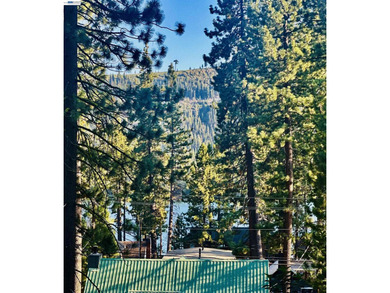 Welcome to this charming Donner Lake retreat with beautiful - photo 2