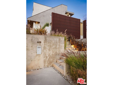 This exquisite residence is a rare intersection of architectural - photo 2