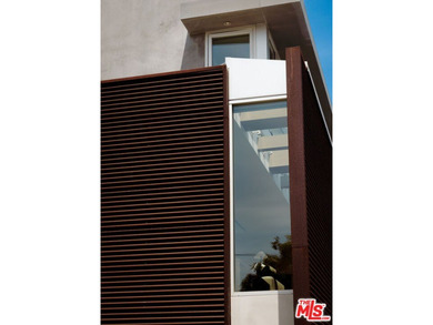 This exquisite residence is a rare intersection of architectural - photo 3