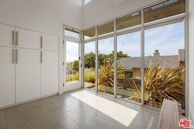 This exquisite residence is a rare intersection of architectural - photo 7