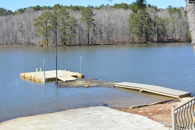 Remarkable waterfront home in a cove with lakefront views. - photo 3