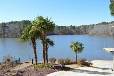 Remarkable waterfront home in a cove with lakefront views. - photo 4