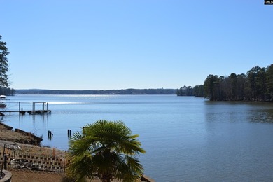 Remarkable waterfront home in a cove with lakefront views. - photo 5