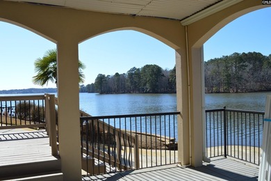 Remarkable waterfront home in a cove with lakefront views. - photo 6