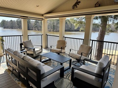 Remarkable waterfront home in a cove with lakefront views. - photo 7