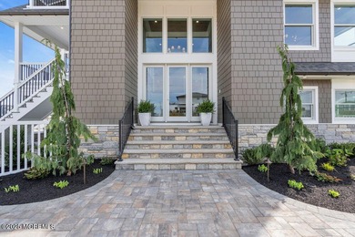 Presenting one of the most iconic custom waterfront homes ever