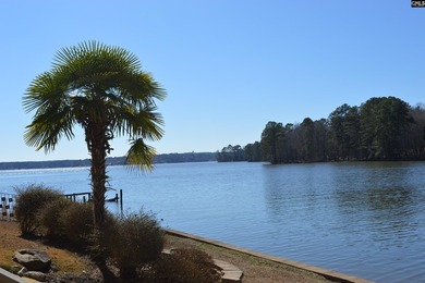 Remarkable waterfront home in a cove with lakefront views. - photo 9