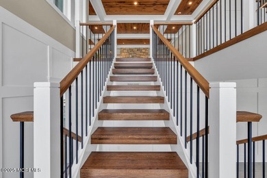 Presenting one of the most iconic custom waterfront homes ever