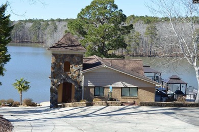 Remarkable waterfront home in a cove with lakefront views. - photo 10