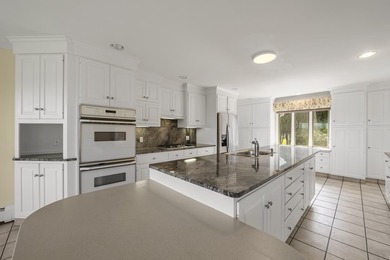 This stunning Executive Ranch faces west and overlooks the - photo 14