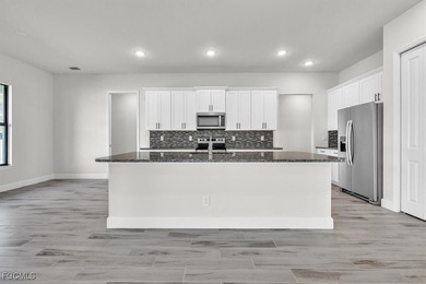 ASSESSMENTS PAID truly making this new construction home - photo 5