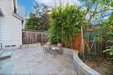 *A private, low-maintenance backyard and a spacious primary - photo 11