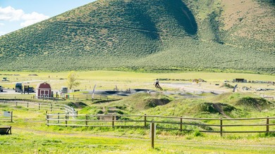 Located in majestic Quigley Canyon, Quigley Farm has been - photo 5