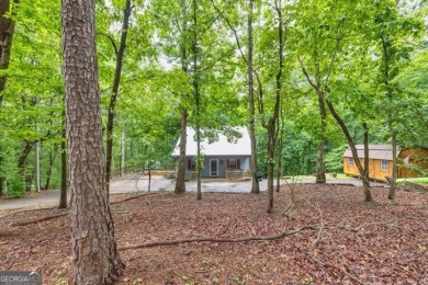 Lake Home For Sale in Flowery Branch, Georgia