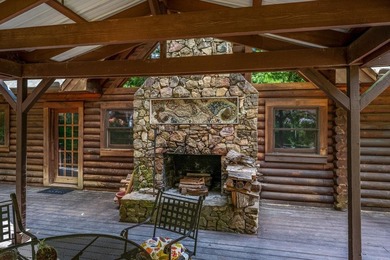 One-owner custom built log home on 2.5 acres on a small lake - photo 6