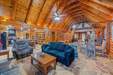 One-owner custom built log home on 2.5 acres on a small lake - photo 8