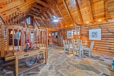 One-owner custom built log home on 2.5 acres on a small lake - photo 10