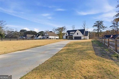 Nestled directly on the banks of the Etowah River, this - photo 1