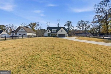 Nestled directly on the banks of the Etowah River, this - photo 3