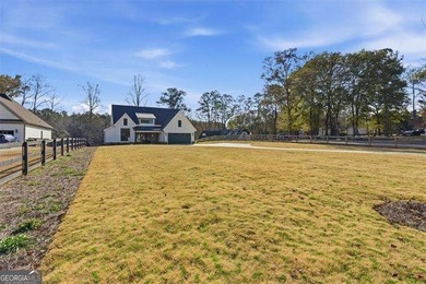Nestled directly on the banks of the Etowah River, this - photo 4