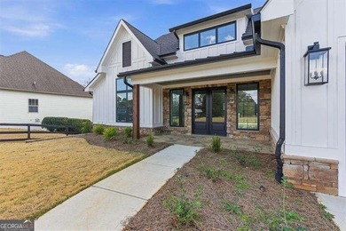 Nestled directly on the banks of the Etowah River, this - photo 6