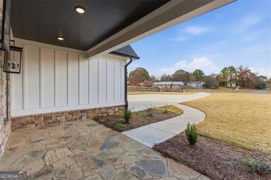 Nestled directly on the banks of the Etowah River, this - photo 7