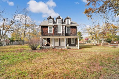 Multi-Family: Located down a tree lined street in the hamlet of - photo 1