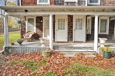 Multi-Family: Located down a tree lined street in the hamlet of - photo 2