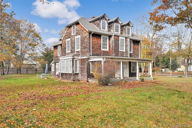 Multi-Family: Located down a tree lined street in the hamlet of - photo 4
