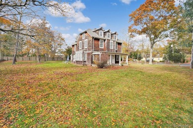 Multi-Family: Located down a tree lined street in the hamlet of - photo 6